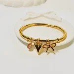HEART AND BOW CHARM