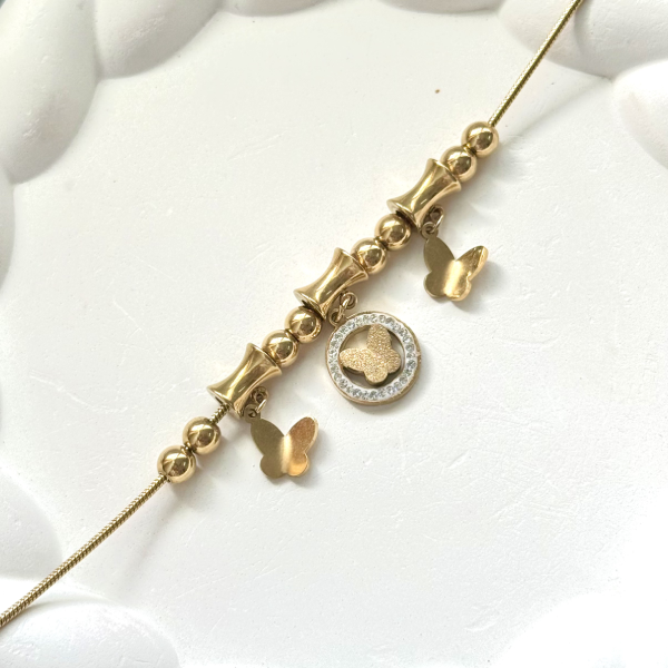 BEADED BUTTERFLY CHARM