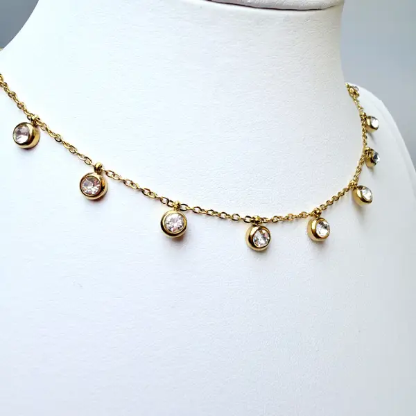MOON CHARM NECKLACE